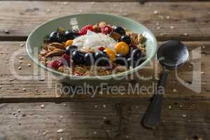 Bowl of breakfast cereals with spoon