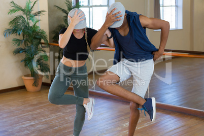 Young friends rehearsing dance