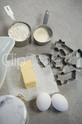 High angle view of pastry cutters with ingredients