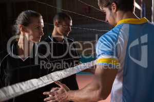 Volleyball players giving handshake