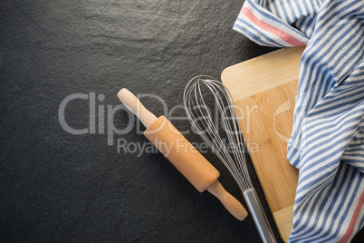 Overhead view of kitchen utensils with napkin