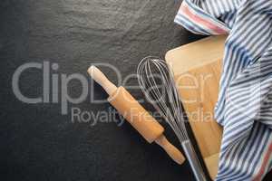 Overhead view of kitchen utensils with napkin