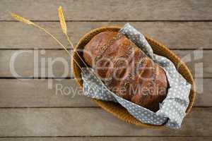 Overhead view of brown bread in basket