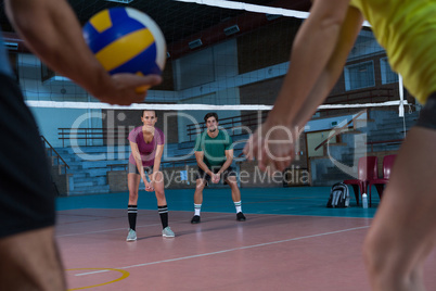 Volleyball players practicing