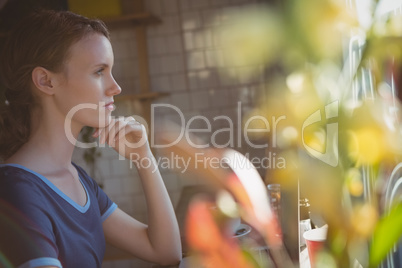 Thoughtful woman in cafe