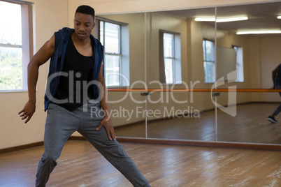 Young dancer practicing at studio