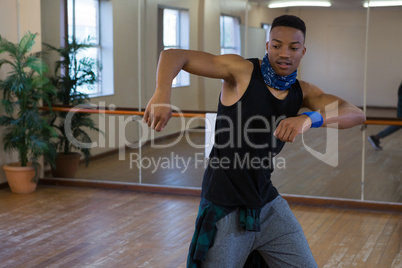 Male dancer practicing at studio