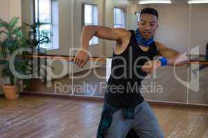 Male dancer practicing at studio