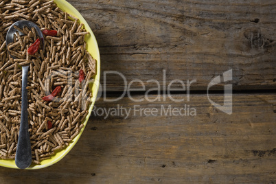 Cereal bran sticks with spoon in plate