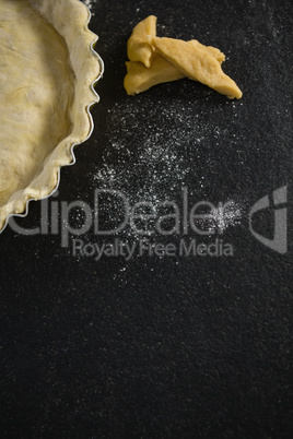 Cropped image of tart dough in backing pan
