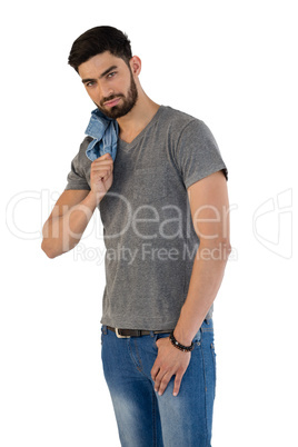 Handsome man posing against white background