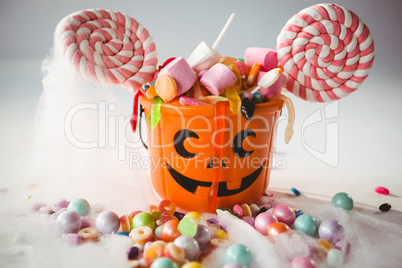 Bucket with various sweet food