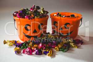 Orange buckets with colorful chocolate