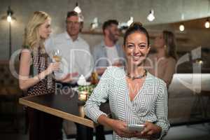 Portrait of beautiful woman using mobile phone