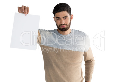 Portrait of man holding white blank sheet