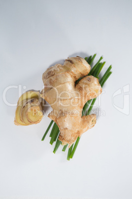 Overhead view of fresh ginger and herb