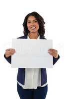 Portrait of happy businesswoman holding placard
