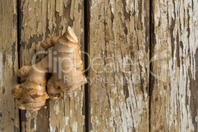 Directly above view of ginger on weathered table