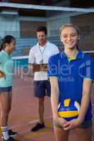 Portrait of volleyball player holding ball