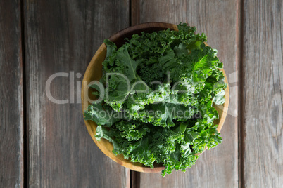 Overhead view of kale in bowl on table