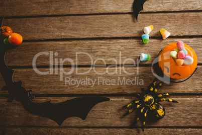 Overhead view of decoration with sweet food during Halloween