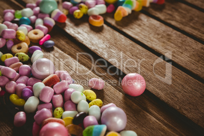High angle view of various candies on table