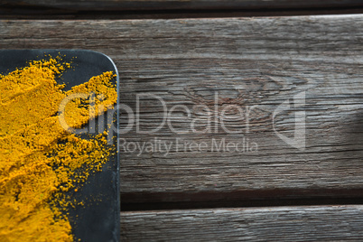 Turmeric powder on board