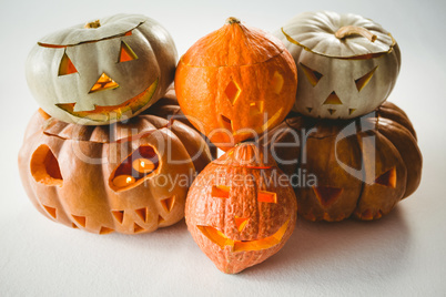 High angle view of jack o lanterns over white background