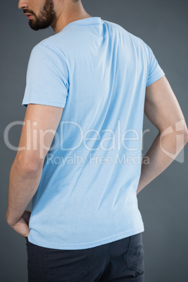 Handsome man posing with hands in pocket