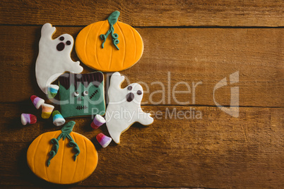Overhead view of cookies with candies on table