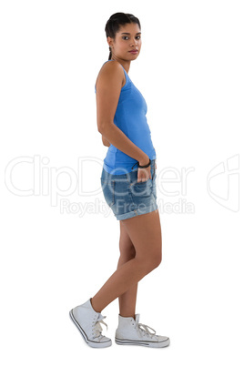 Side view full length portrait of young woman