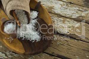 Sea slat on wooden plate