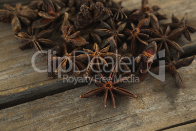 Star anises on wooden table