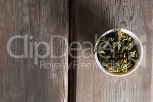 Dried kale in bowl on table