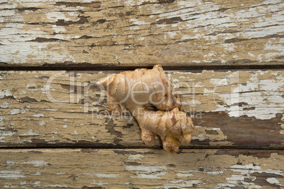 Overhead view of ginger on weathered table