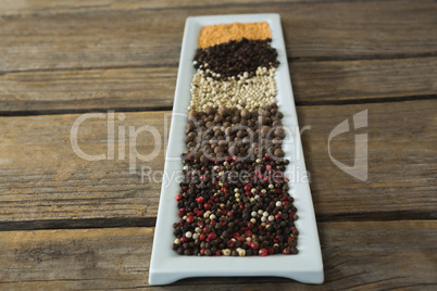 Various type of spices arranged in tray