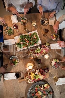 Overhead of friends dining together