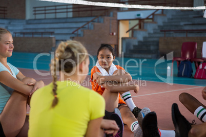 Smiling female players having a break