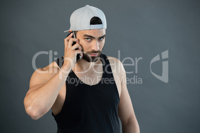 Portrait of man talking on mobile phone