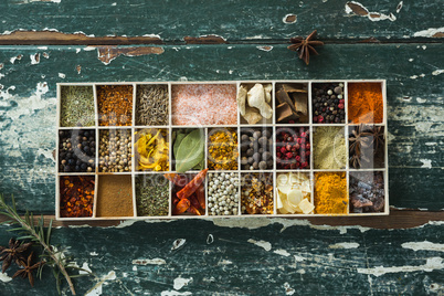 Various spices on wooden table
