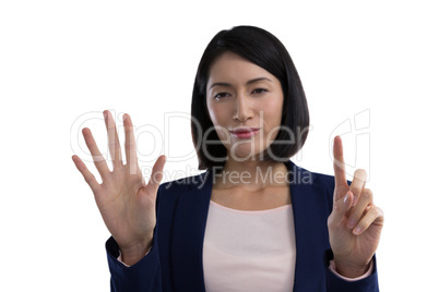 Businesswoman using invisible screen