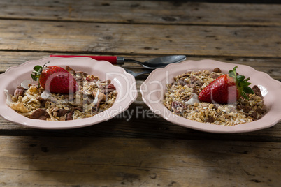 Muesli and strawberry in bowl