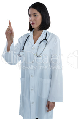 Female doctor touching invisible screen