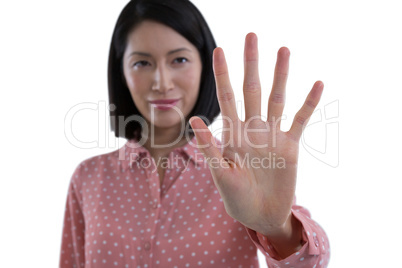 Woman pretending to touch an invisible screen