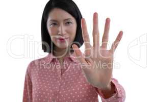 Woman pretending to touch an invisible screen