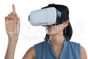 Female executive gesturing while using virtual reality headset