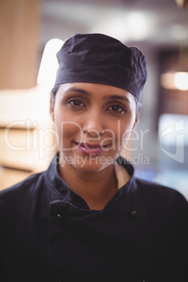 Portrait of smiling young attractive waitress