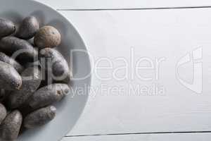 Overhead view of sweet potatoes in plate on table