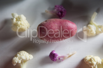 Close-up of sweet potato with cauliflowers