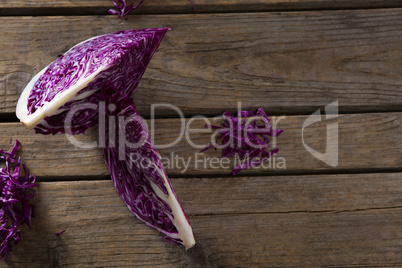 Red cabbage on wooden table